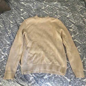 Beige stickad tröja - Beige stickad tröja från selected homme.