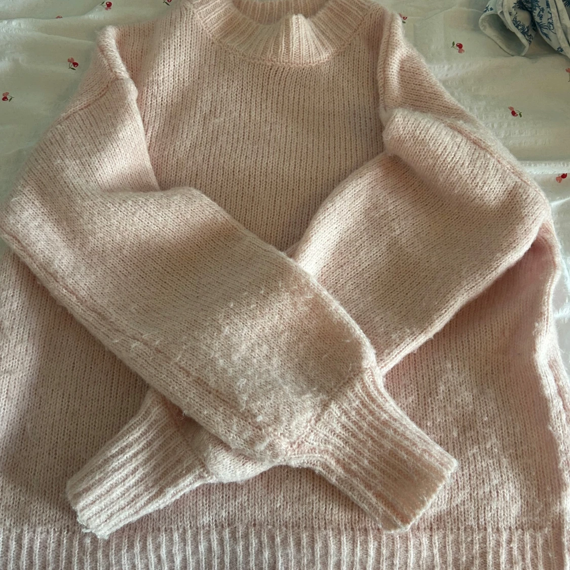 Ljusrosa stickad tröja - 1