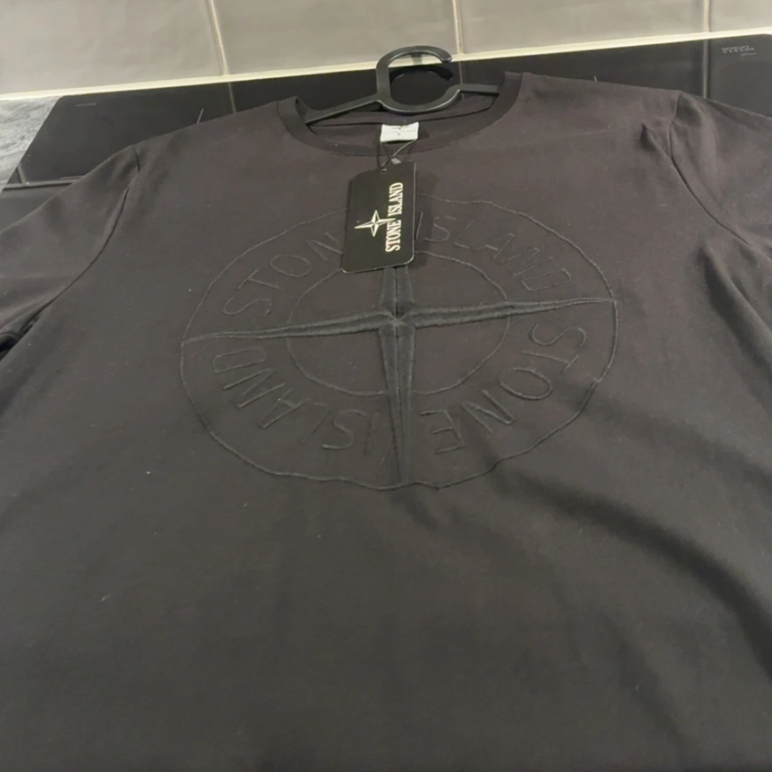 Svart Stone Island t-shirt med brodyr