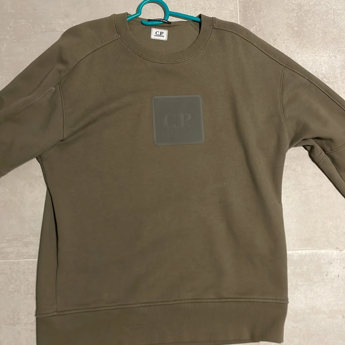 Olivgrön sweatshirt från C.P. Company - 1