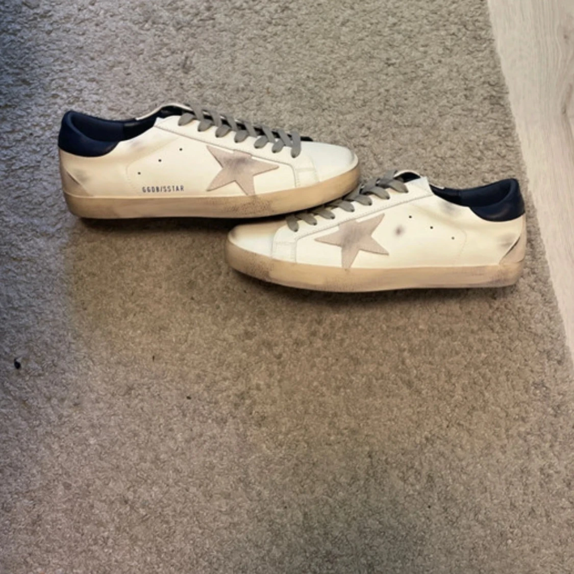 Golden Goose vita sneakers med stjärna