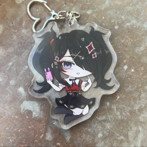Needy streamer overload Ame keychain - Keychain of Ame from Needy streamer overload! Perfect for your bag decorations or collection :)  (There might be scratches on the surface but that’s only on the protective layer of plastic, peel it off on both sides and it’ll be perfectly shiny!)