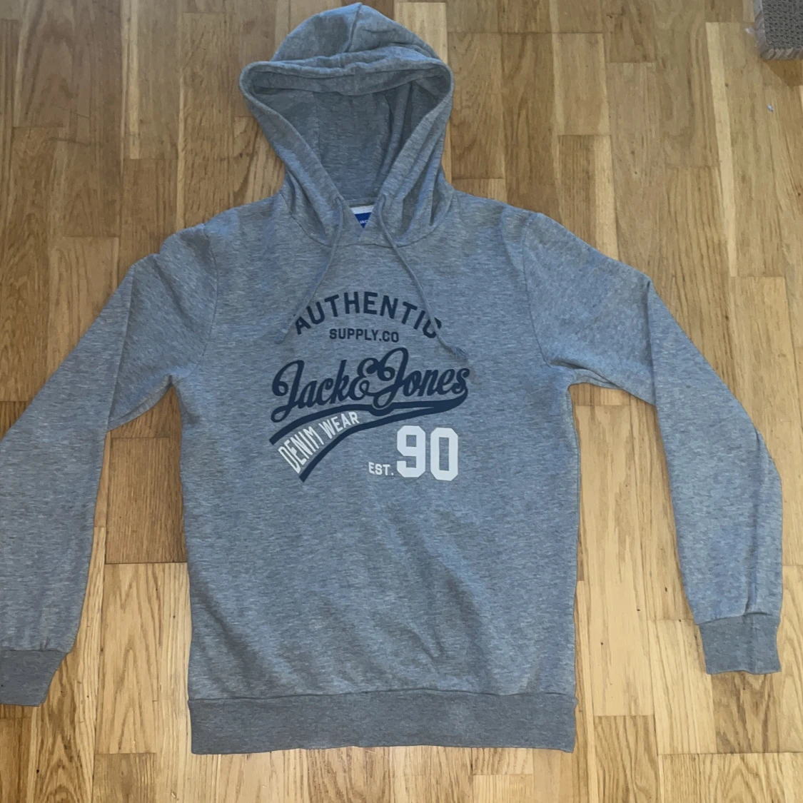 Grå hoodie från Jack & Jones storlek S