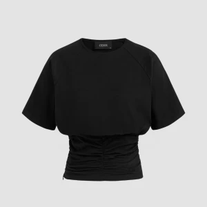 Smockad T-shirt från cider - Säljer den populära svarta smockade T-shirten som är slutsåld i denna storlek! Endast använd fåtal gånger. Den har även en dragkedja på ena sidan vid den smockade biten. Säljs då den ej kommer till användning 