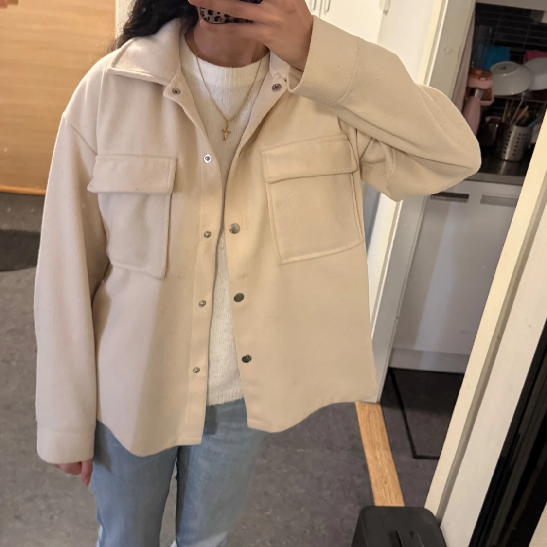 Kappa med två fickor 