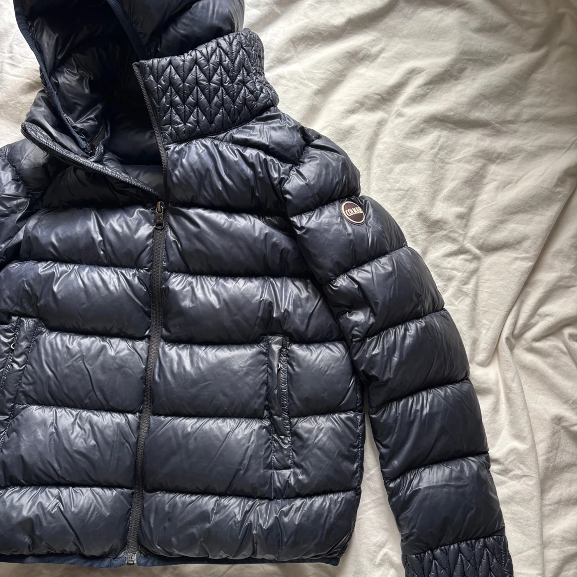 Mörkblå jacka från Colmar med huva - 1