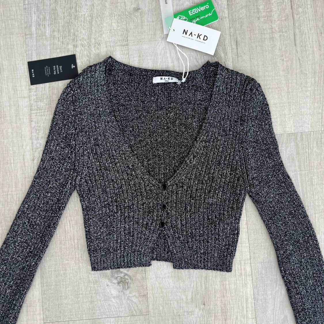 Svart glittrig tröja