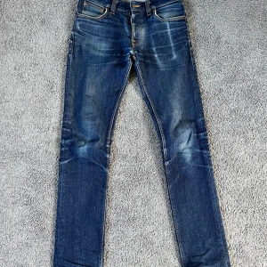 Nudie jeans grim tim  - Nudie jeans i modellen grim Tim. Storlek 30/32. Färg dry true navy. Skick ses på bilderna. 