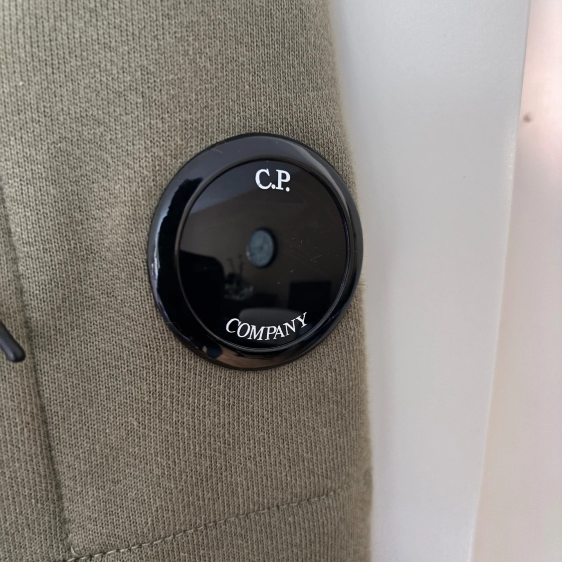 Olivgrön sweatshirt från C.P. Company - 1