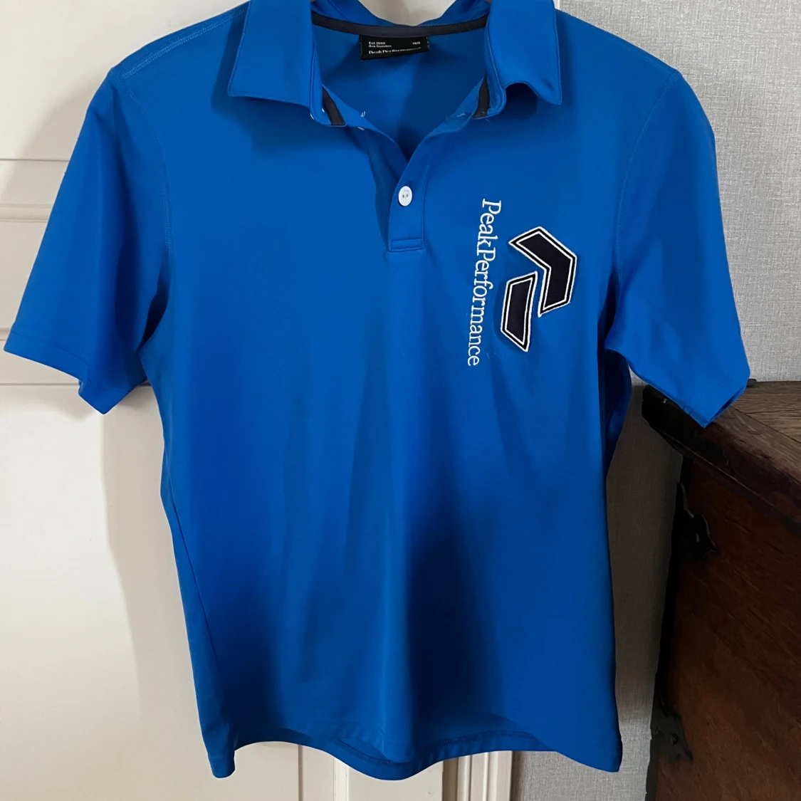 Blå piké t-shirt från Peak Performance