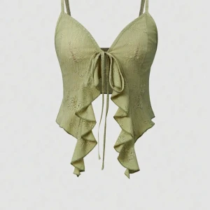 Grön linnetopp med volang och knyt - Söt linnetopp med volanger, aldrig använd.