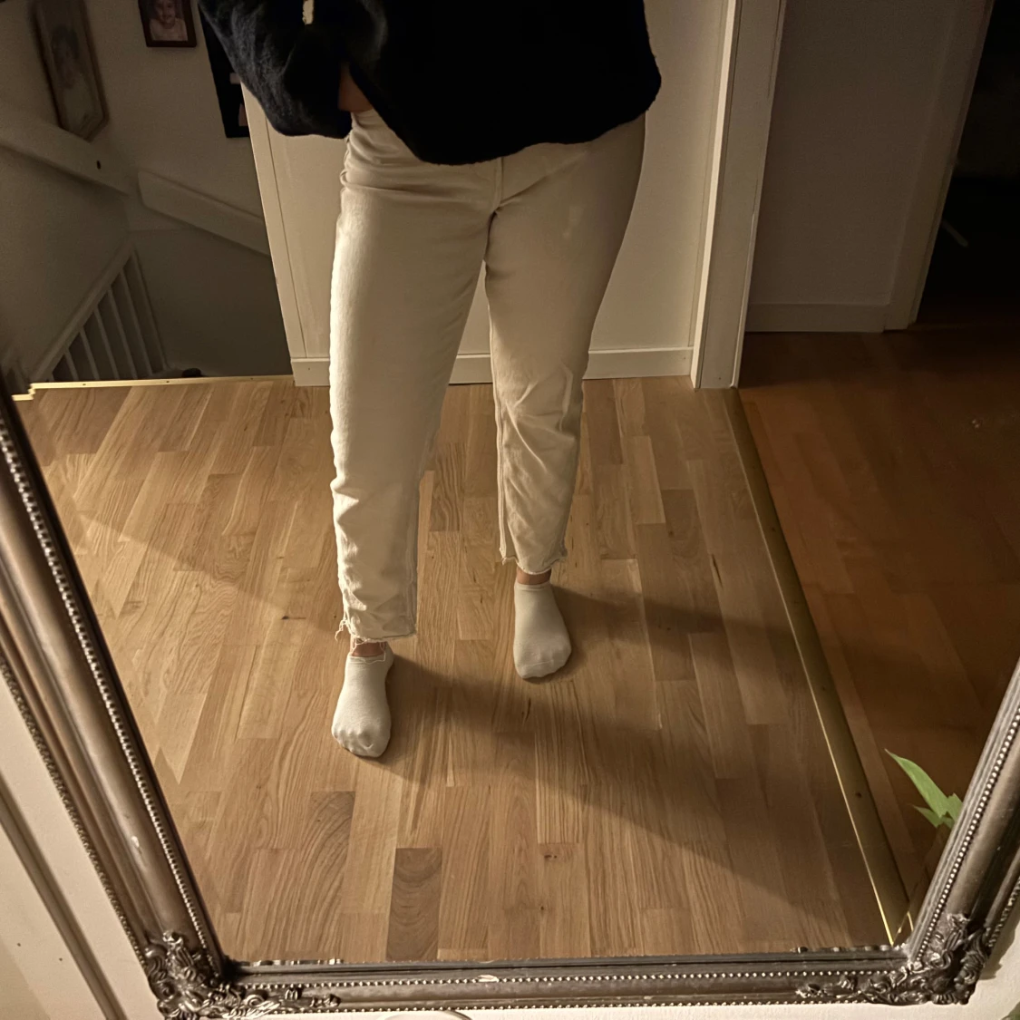 Beige byxor med fransar