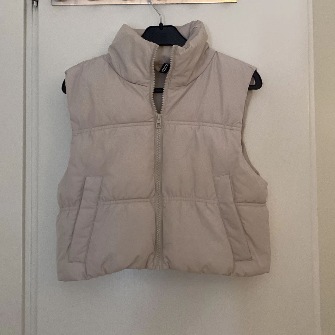 Beige dunväst från H&M Divided XS