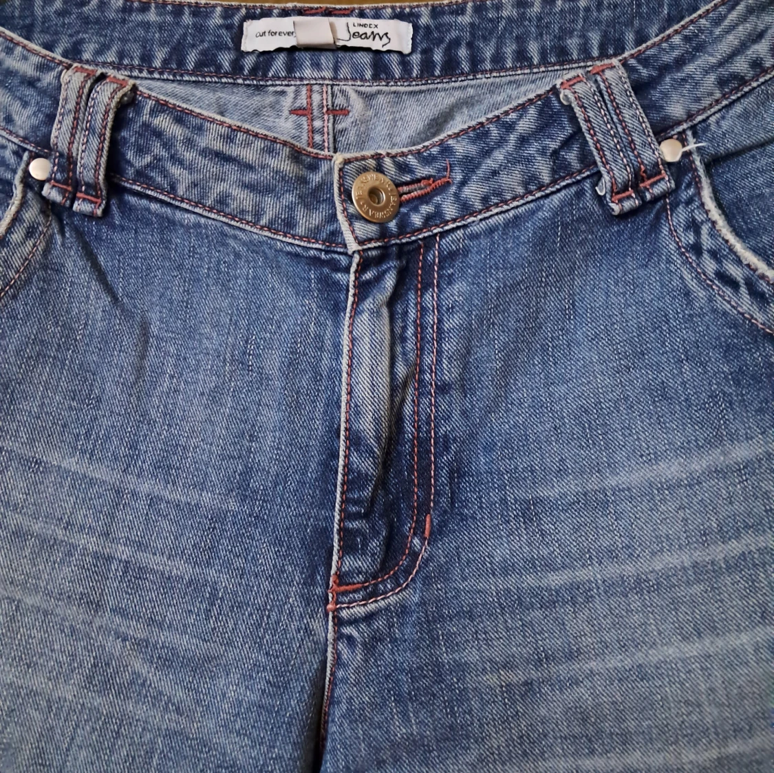 Blå bootcut jeans från Lindex - 1