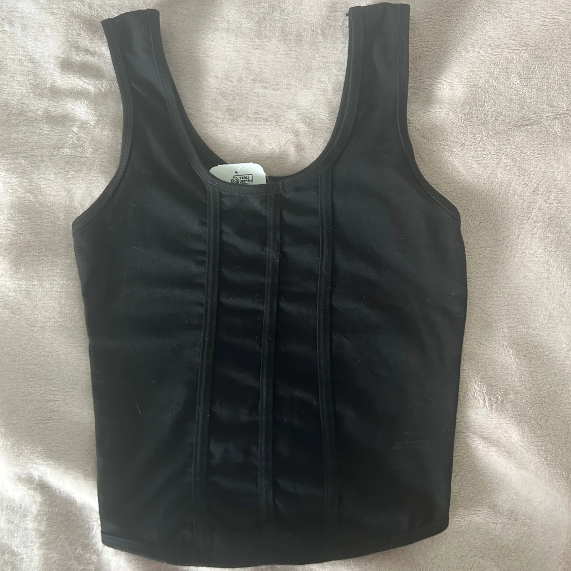 Svart korsettliknande topp