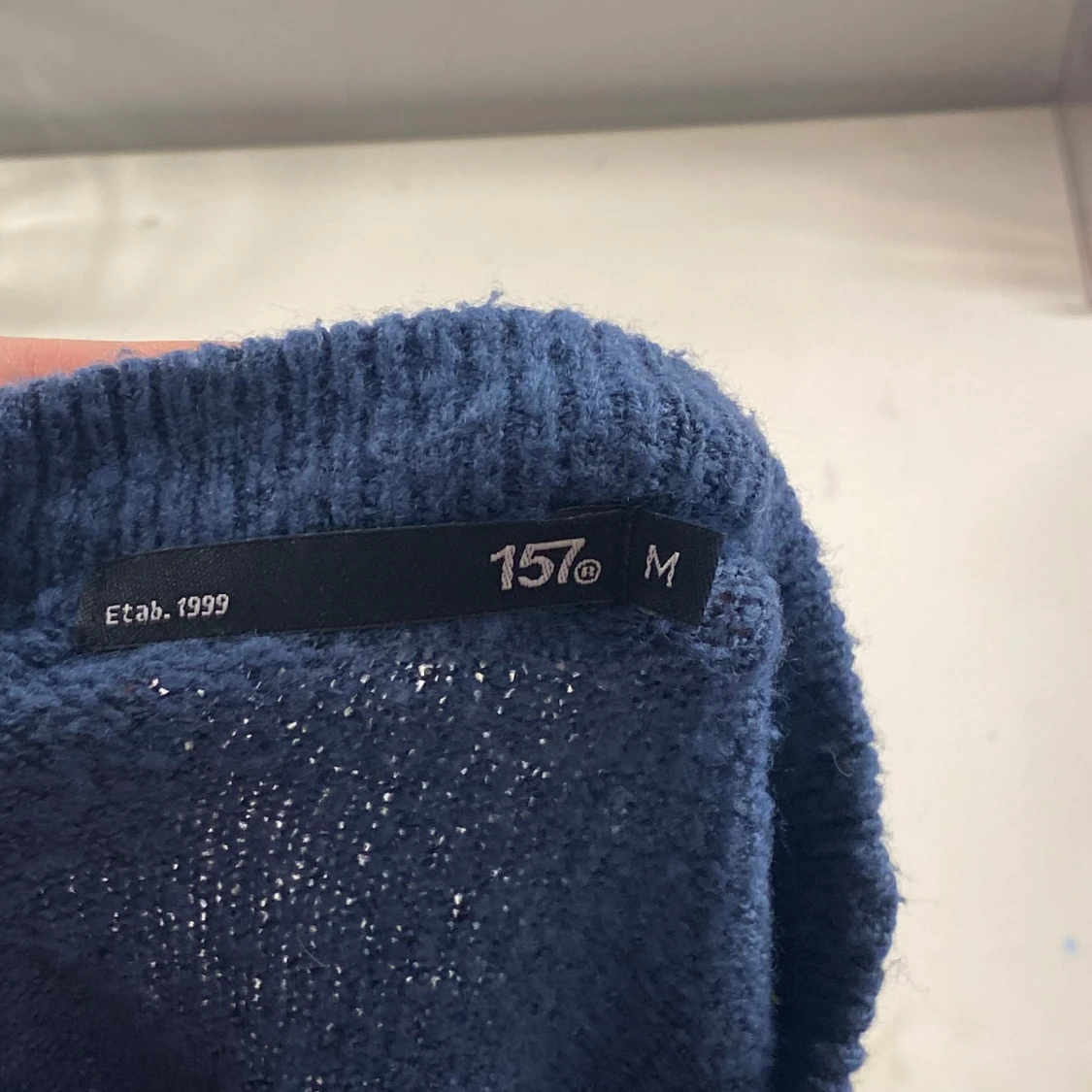 Blå stickad tröja från 157 - 2