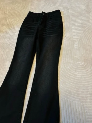 Jeans  - Ett par jeans oanvända snygga.