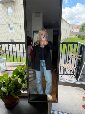 Jeans - Lågmidjade raka jeans 