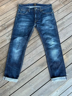 Selvedge Lee Jeans - Riktigt feta selvedge jeans med sjysta fades. 32/32 men dom är lite nerkortade 
