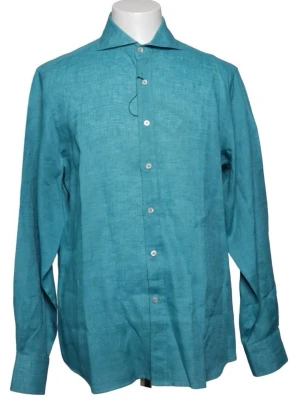 Ny turkos linneskjorta Canali (XL) - Snygg turkos skjorta i linne ifrån italienska Canali med klassisk krage och långa ärmar. Skjortan har en rak passform och stängs med vita knappar framtill. Perfekt för en fräsch och avslappnad stil. Skjortan är ny, inga fläckar, slitage eller tecken på tidigare användning.