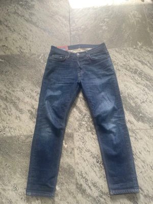 Acne jeans - Blå konst acne jeans perfekt för alla tillfällen
