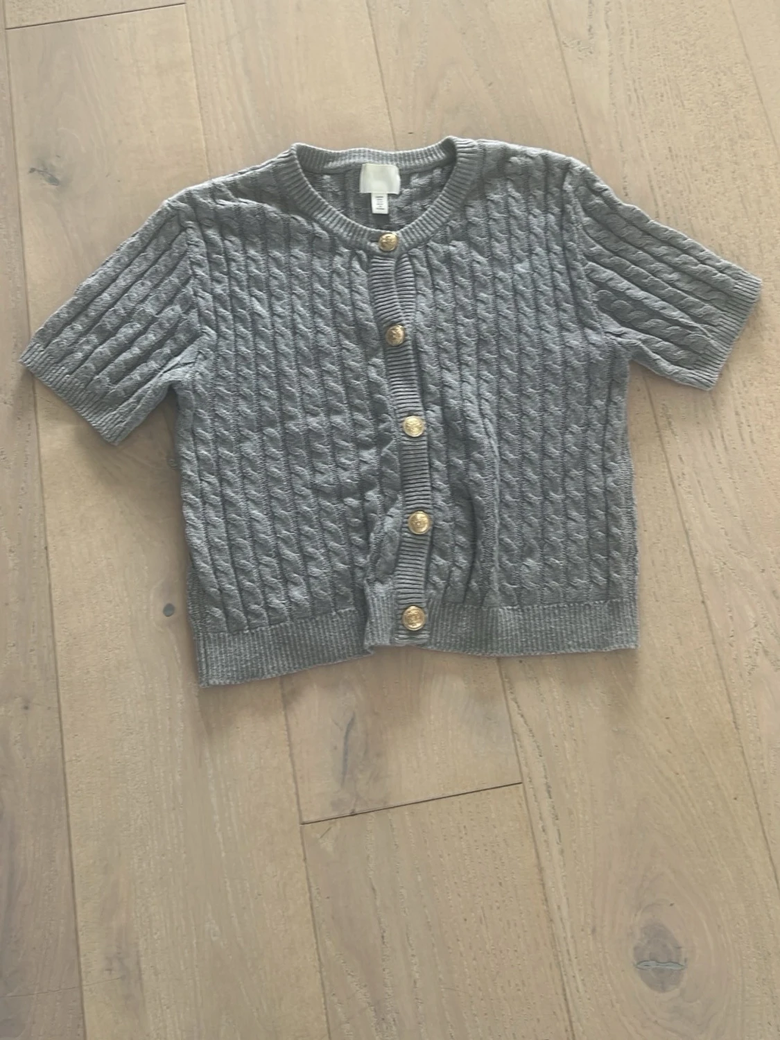 Grå kabelstickad kofta H&M