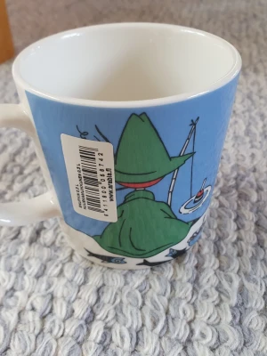 Muminmugg Snusmumriken Mumin  - Utgången felfri mugg med etikett kvar. Packar mycket bra. 