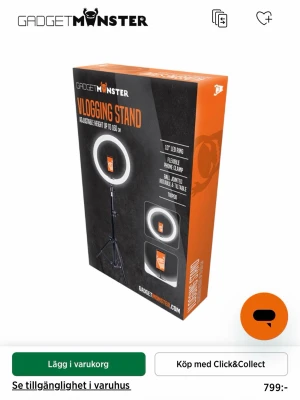 Vlogging Stand med LED-ring - Säljer ett GadgetMonster Vlogging Stand med 10" LED-ring, flexibel mobilhållare och tripodstativ. Perfekt för vloggning, streaming eller foto. Stativet är svart och LED-ringen är vit. Höjden är justerbar och materialet är plast och metall.
