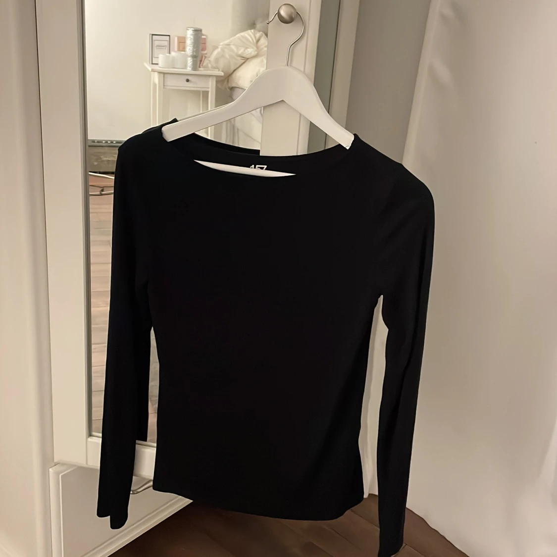 Svart långärmad topp från 157 - 90
