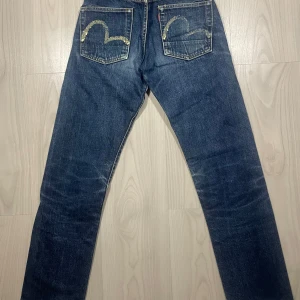 Evisu selvedge denim - Used condition. The print and tags have fading. No heeldrag, rips or stains. Authentic, made in Japan. Size 26/35 on the tags, DM for measurements or other questions