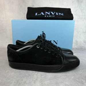 Lanvin captoe sneaker - – Condition: 7/10  – Size: 44/UK10  – What is included:  Only the sneakers  – Retail price: 6400 SEK  This model fits big, our recommendation would be to go down one size from your normal one.