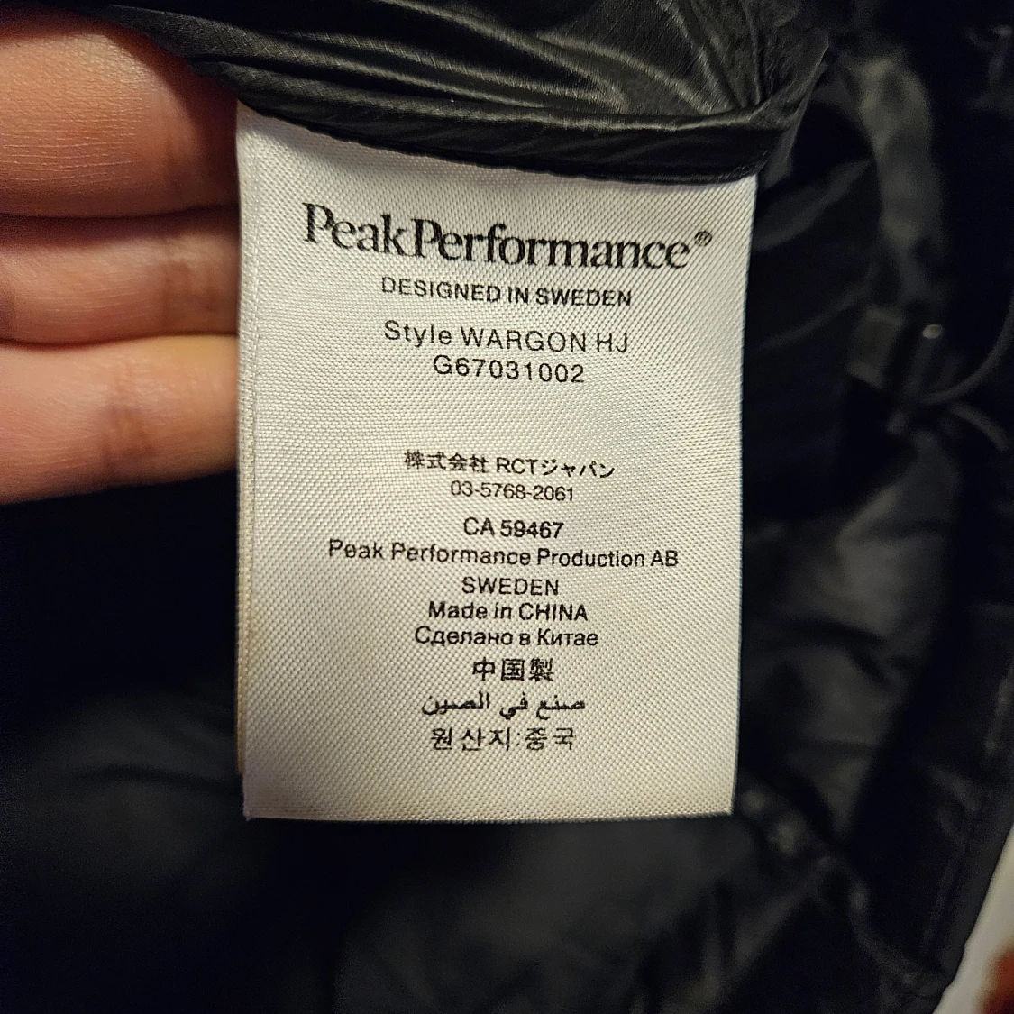 Svart dunjacka från Peak Performance - 92