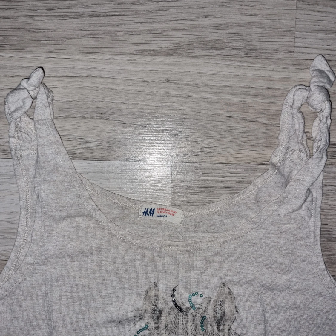 Ljusbeige linne med hästmotiv från H&M - 90