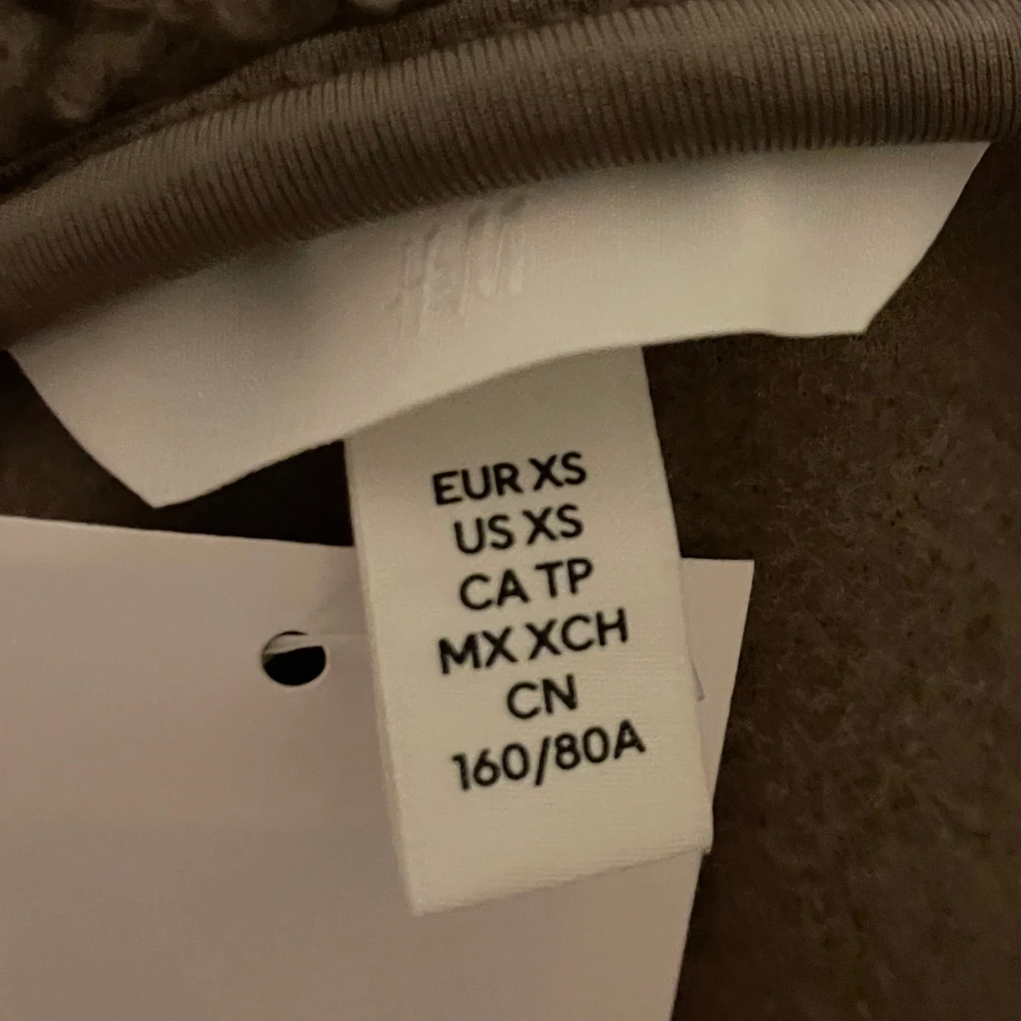 Beige teddyjacka hm - 93