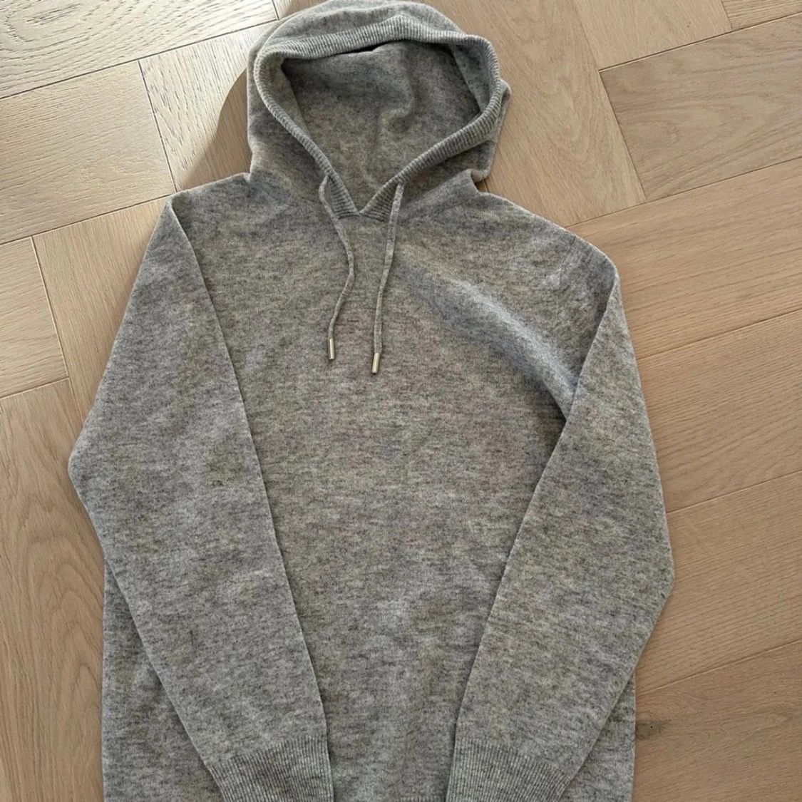 Ljusgrå Merinoull Hoodie