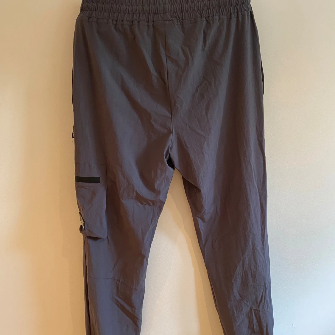 Grå vindjacka och vindbyxor från Hoodrich - 93