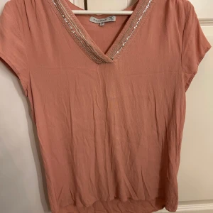 Rosa topp - Rosa topp från flash Woman storlek m