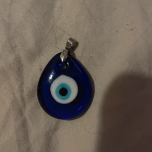 Evil Eye Berlock - sparsamt använd
