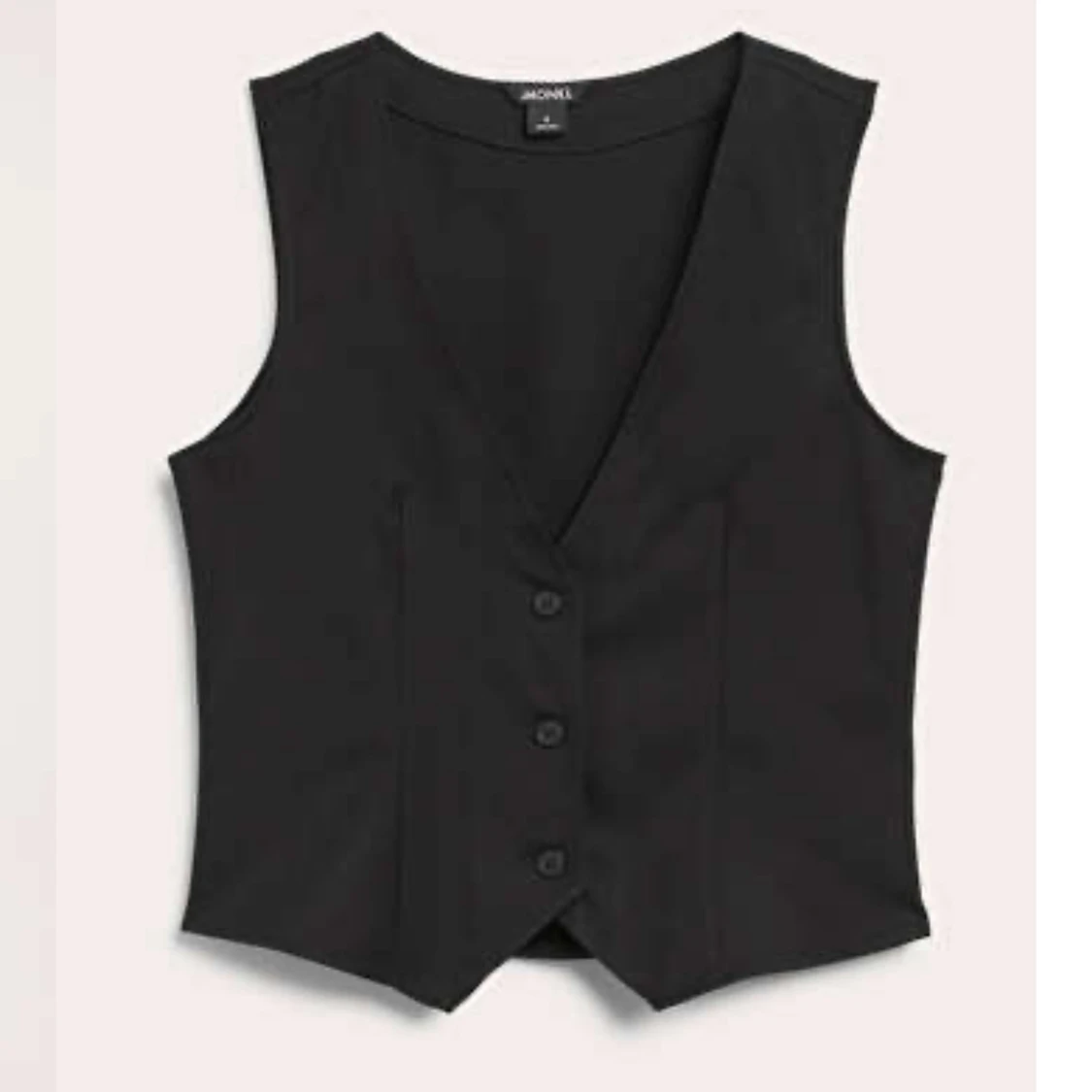 Figursydd svart väst