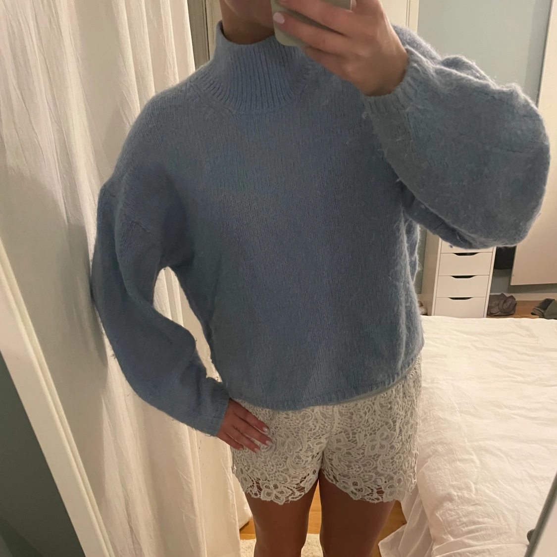 Ljusblå stickad tröja
