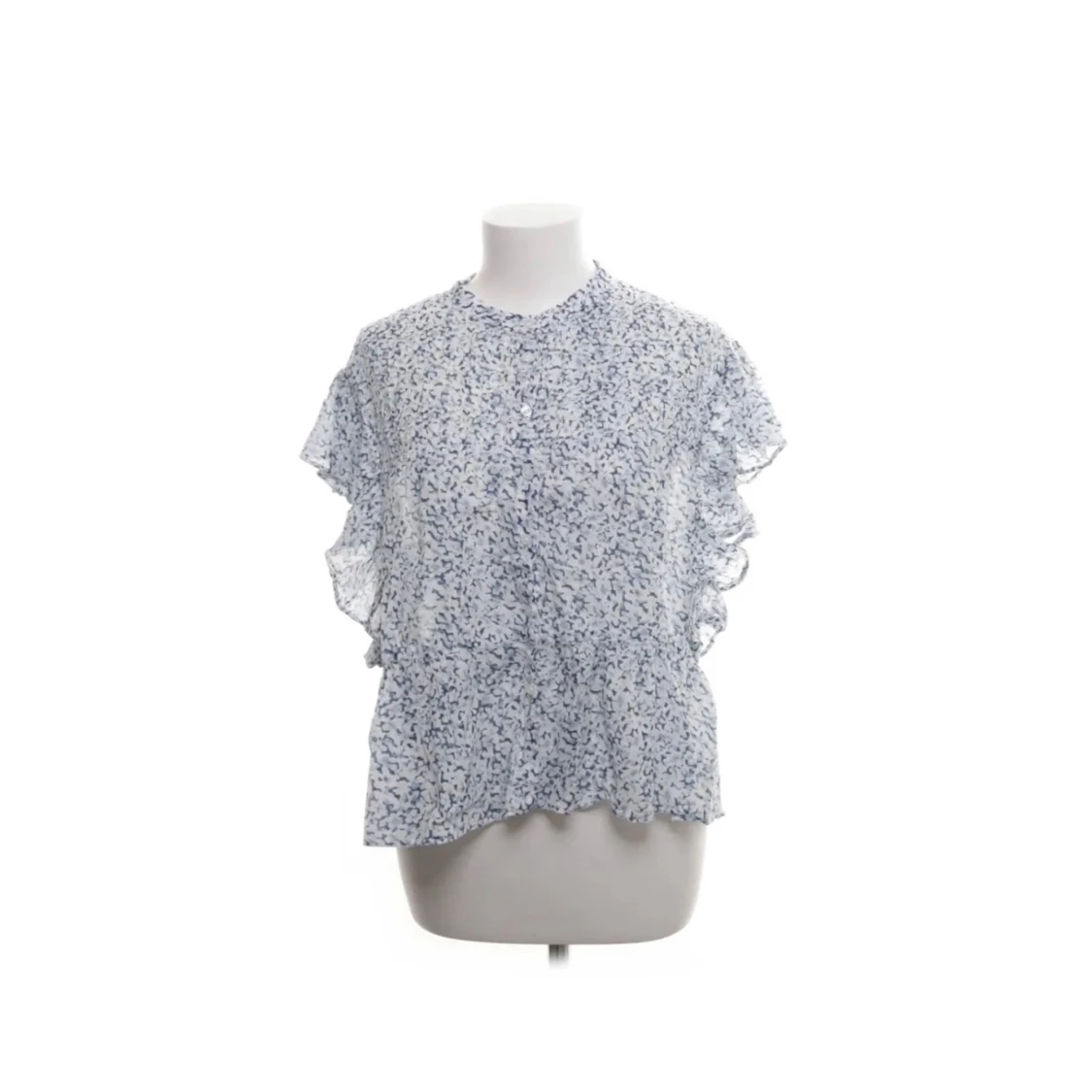 Blommig topp med volangdetaljer