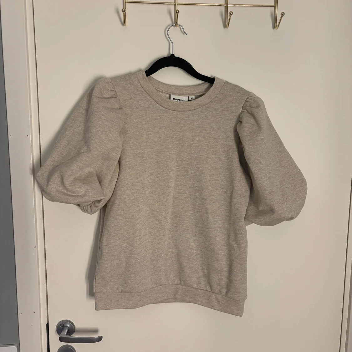 Superfin glittrig blus