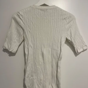 Tight ribbad t-shirt - Tight ribbad t-shirt. Okej skick!