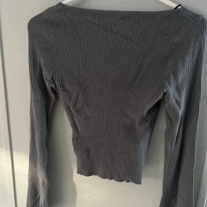 Ribbstickad tröja - Sååå fin tröja men används aldrig. Den har djup rygg och fina, vida ärmar.