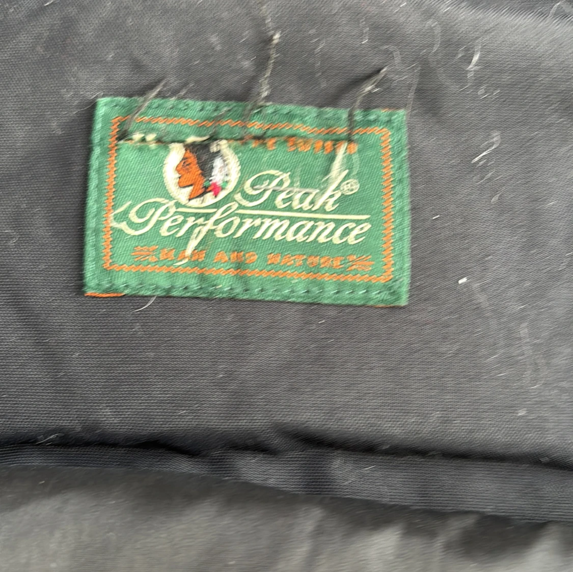 Svart dunjacka från Peak Performance - 91