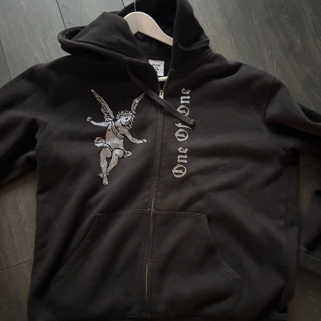 one of one zip hoodie