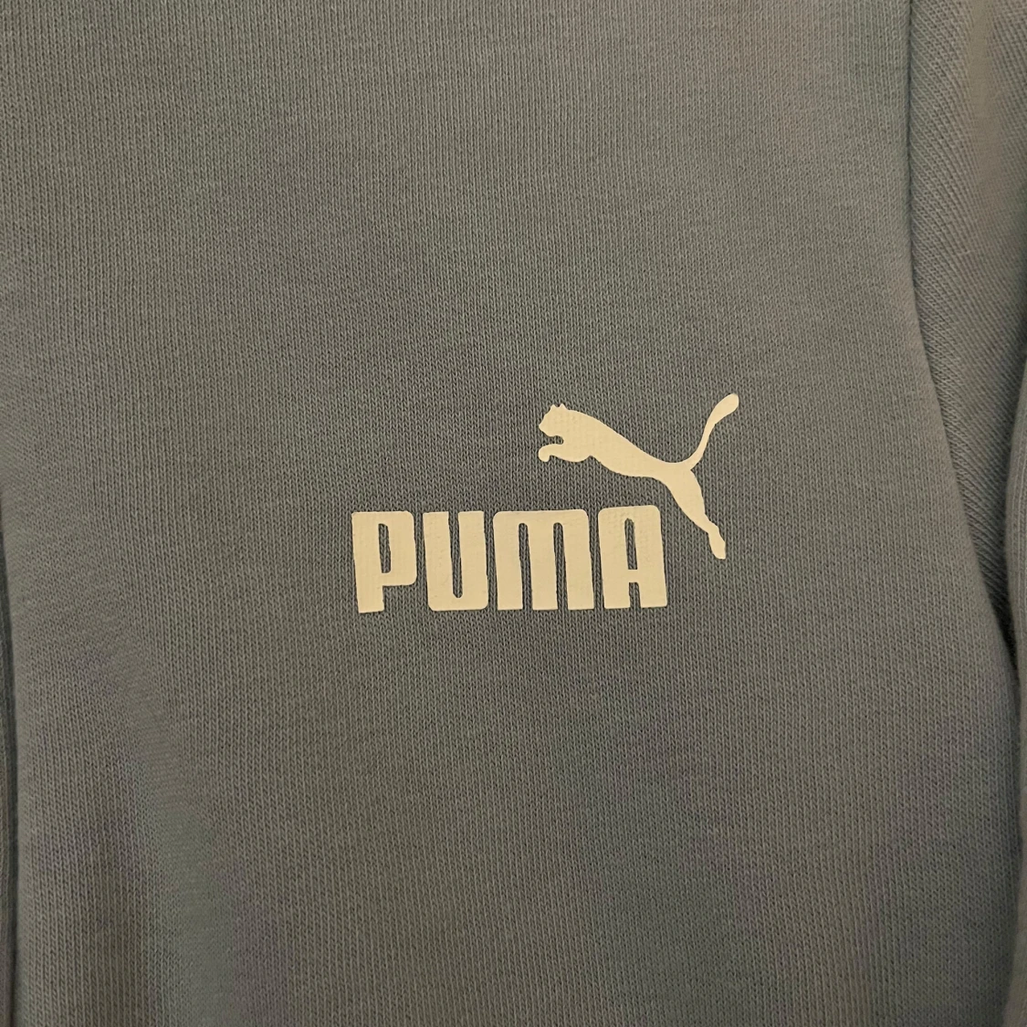 blå hoodie från Puma - 1