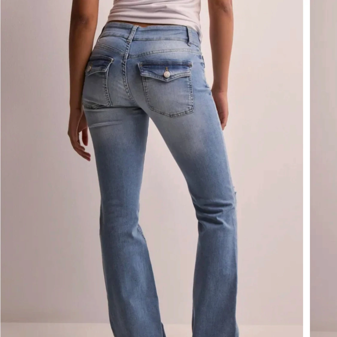 Blå bootcut jeans från Nelly  - 1