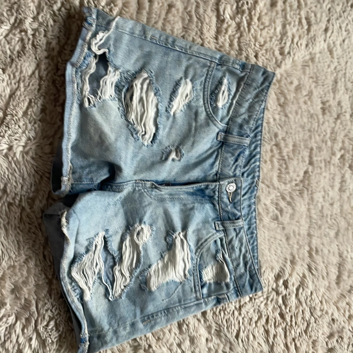 Ljusblå jeans shorts