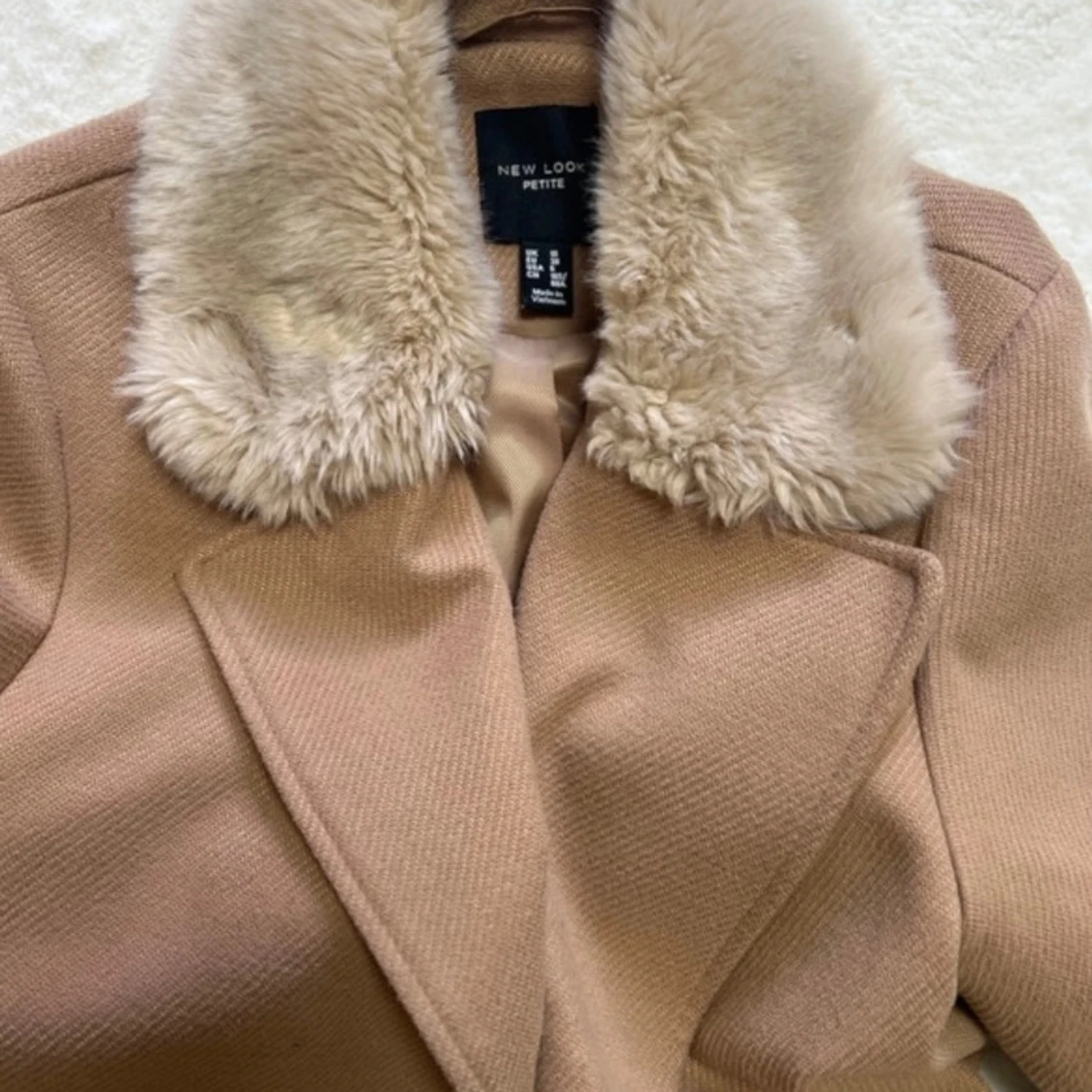 Beige kappa från New Look - 2